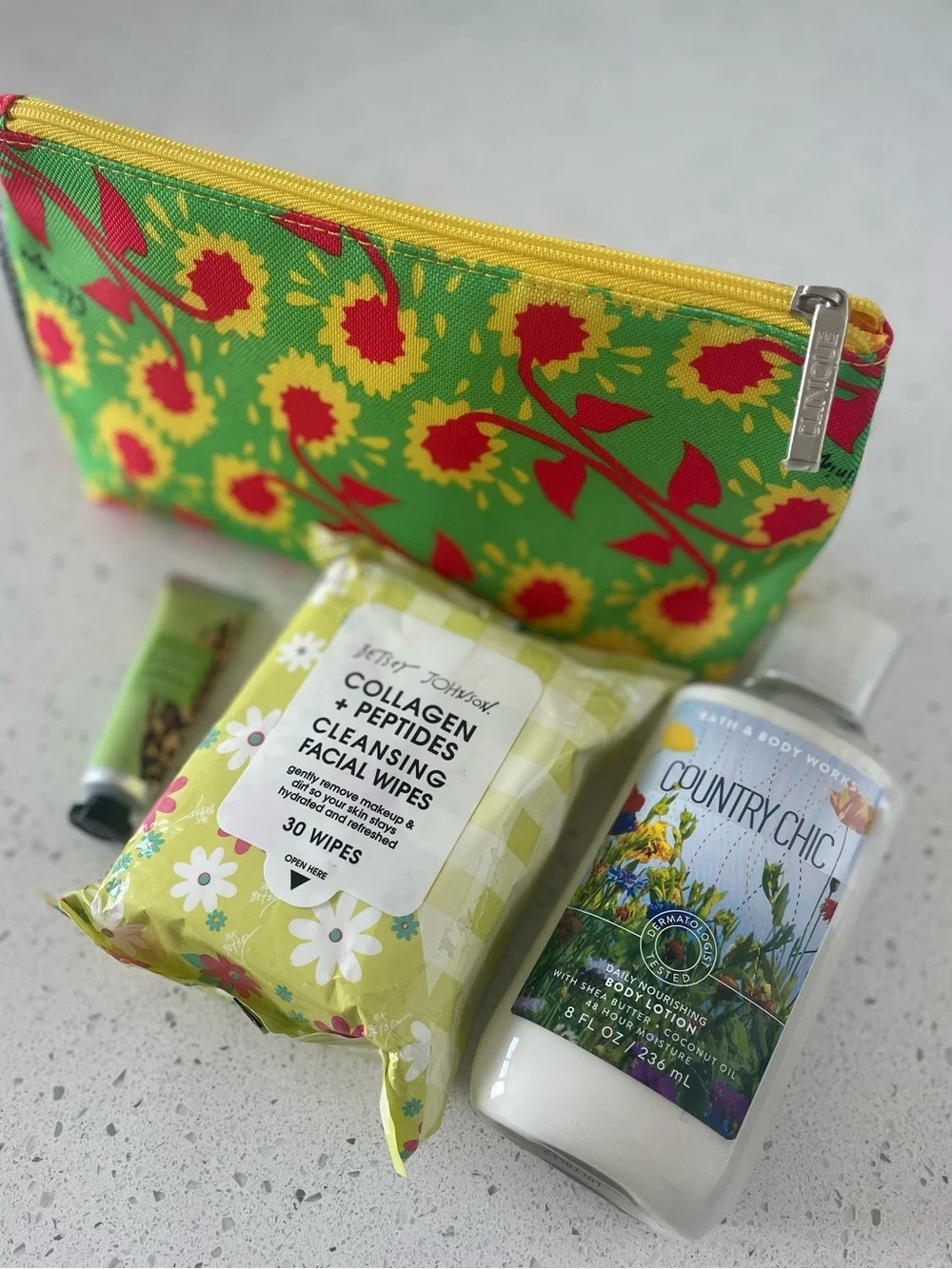 Bundle -Clinique Makeup bag, BBW lotion, Betsey Johnson face wipes, and lip balm